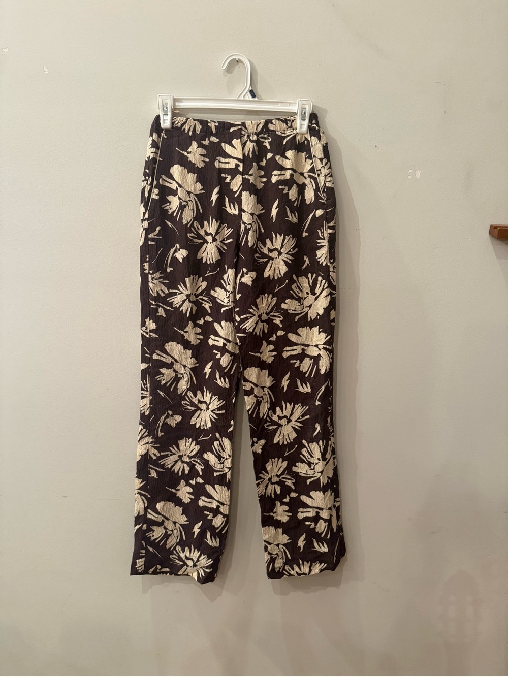 Nanushka Black Corduroy Pants with Cream Floral Print